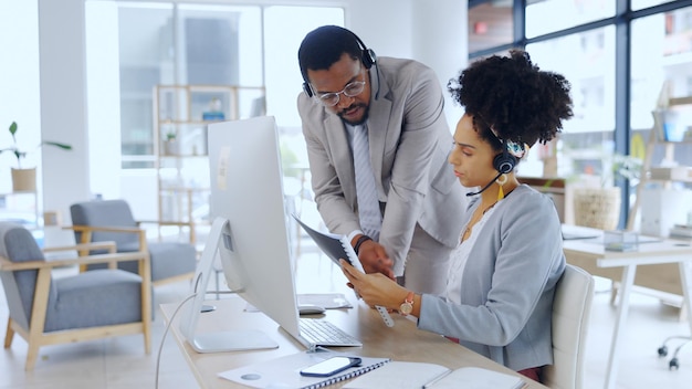 business people consultant and call center with documents for coaching in customer service at office businessman and woman with paperwork or headphones in advice help or legal support at workplace