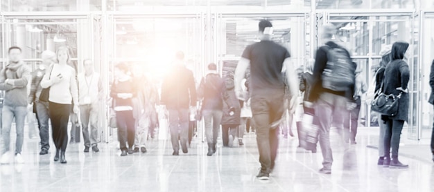 Business people crowd at an expo concept