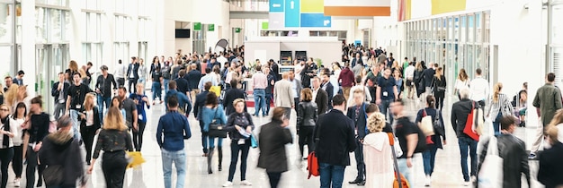 business people crowd at a tradeshow, banner size. ideal for websites and magazines layouts