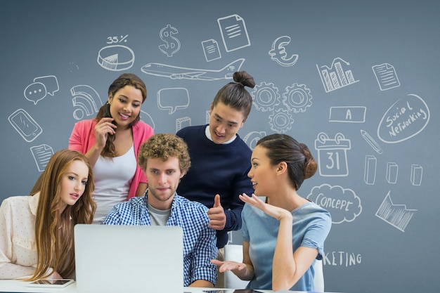 Business people at a desk looking at a computer against blue background with graphics