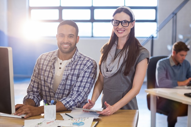 Business people at desk in office