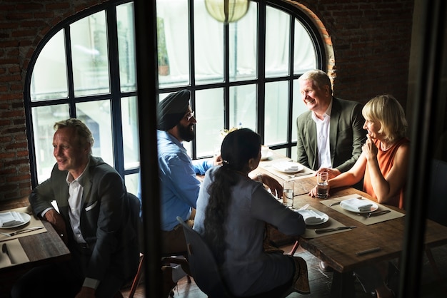 Photo business people dining together concept