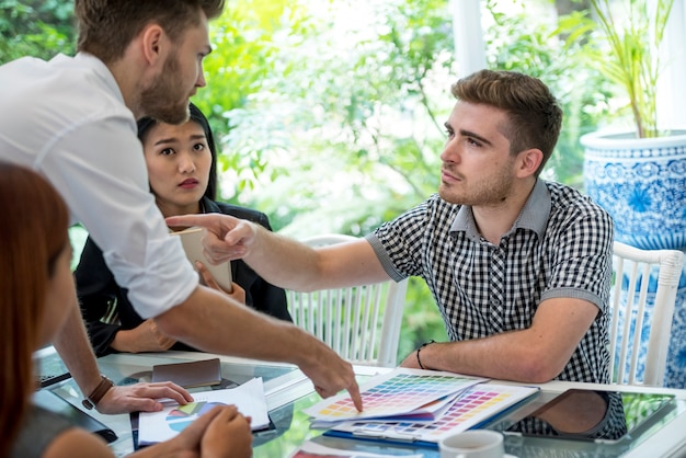 business people discuss and argue over something during their meeting, at the office