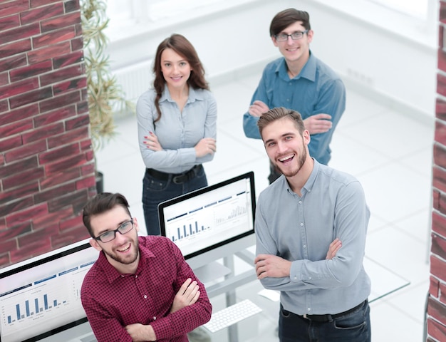 Business people discuss something at the meeting at the modern office building