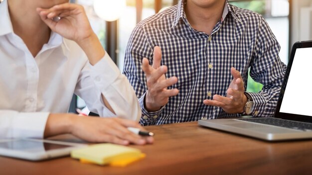 Photo business people discussing over document in meeting at office