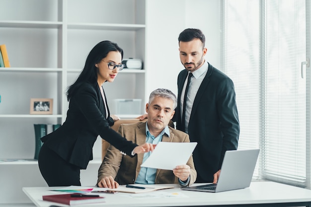 The business people discussing in the office