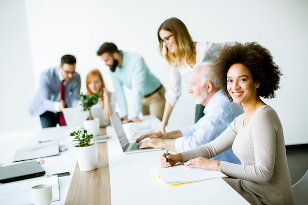 Photo business people discussing a strategy and working together in the modern office