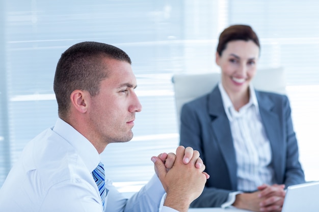 Business people in discussion in an office