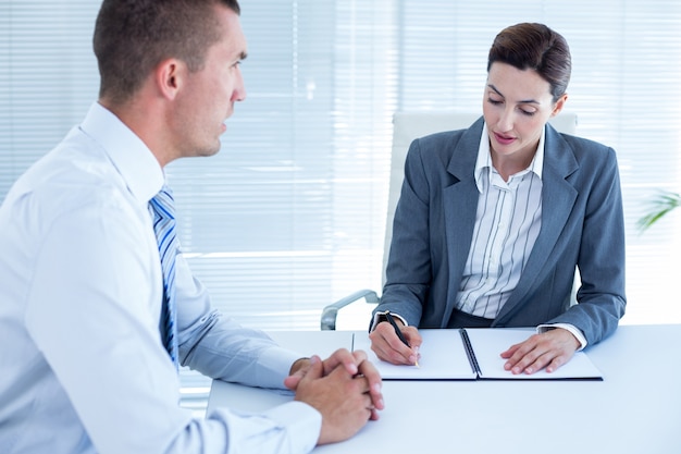 Business people in discussion in an office