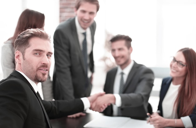 Business people doing handshake after agreement