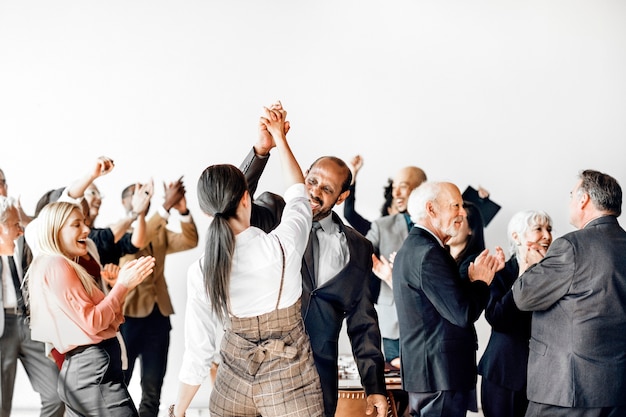 Business people doing a high five