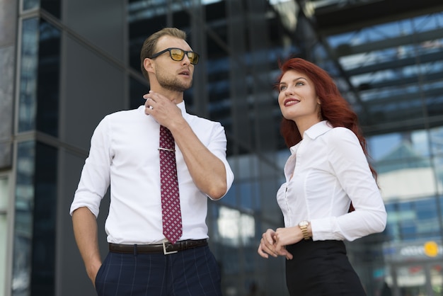 Business people in front of their office