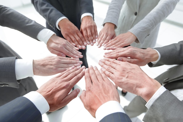 Business people giving each other their hands