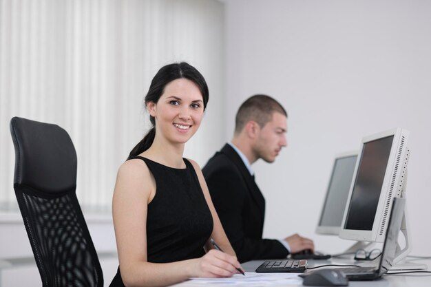 business people group with  headphones giving support in  help desk office to customers, manager giving training and education instructions