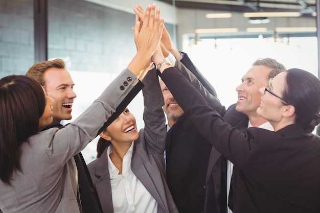 business people hands stacked over each other