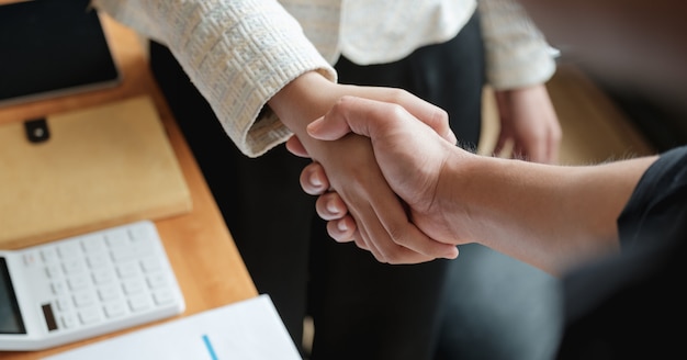 Photo business people handshake for teamwork of business merger and acquisition