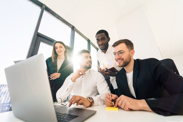 Business people have meeting at laptop