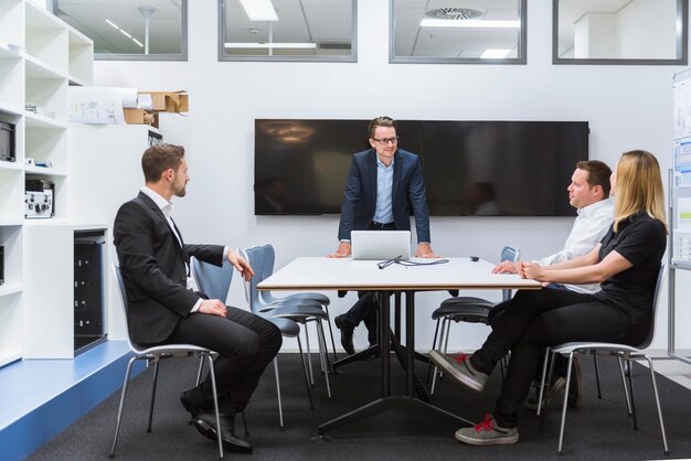 Photo business people having a meeting in conference room