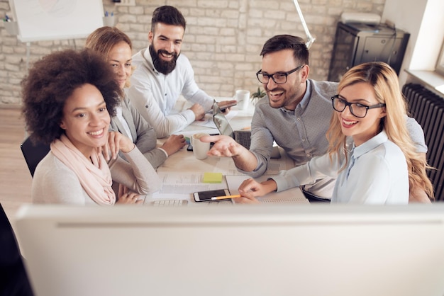 Photo business people having meeting in modern office