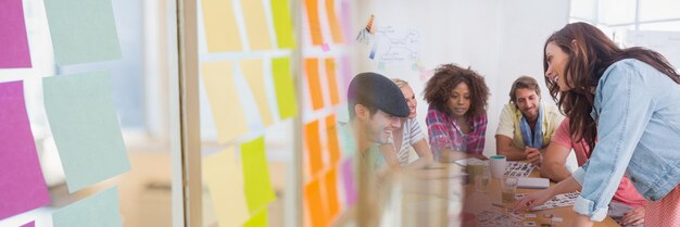 Photo business people having a meeting with colorful sticky notes transition effect