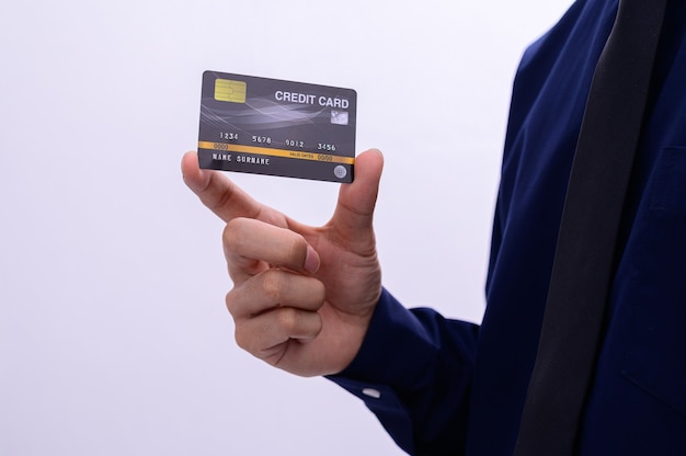 Business people hold credit card