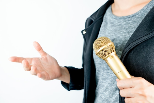 Business people holding microphone isolated