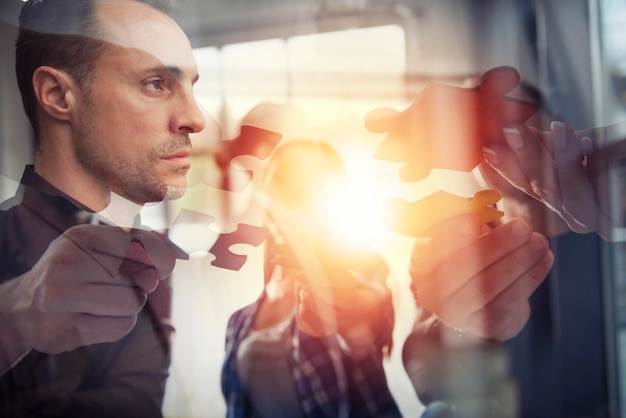 Photo business people join puzzle pieces concept of teamwork and partnership double exposure