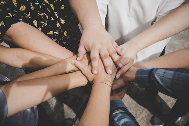 Business people joining hands