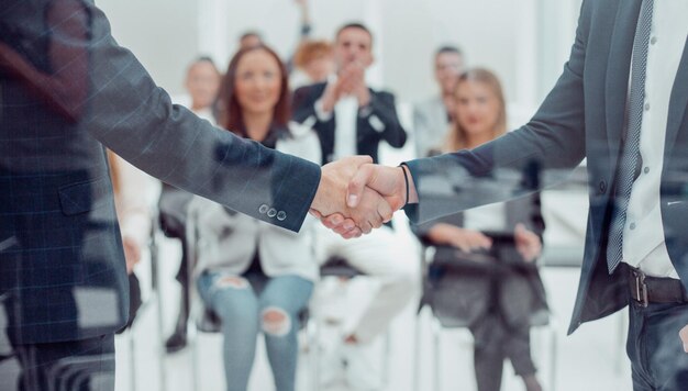 Business people meet each other with a handshake