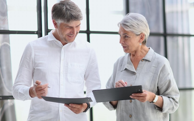 Business people meet in the office and discuss joint business projects