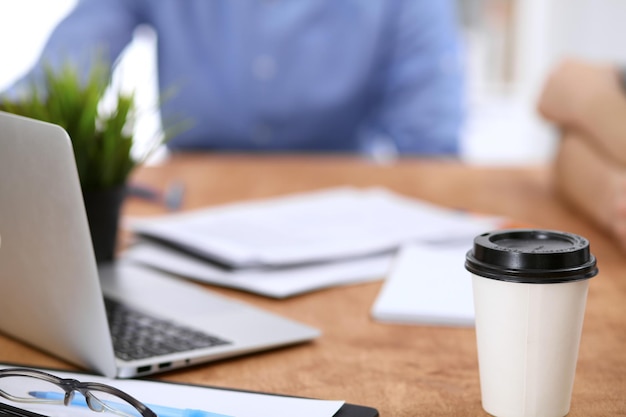 Business people meeting around table