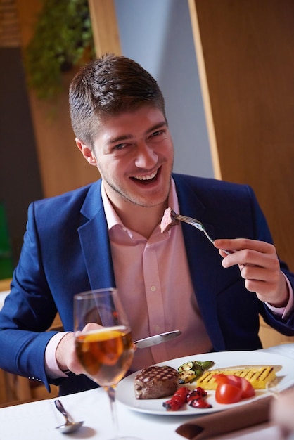 business people meeting in modern restaurant, romantic couple having dinner and take drink after work