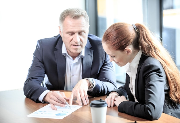 Business people at meeting table