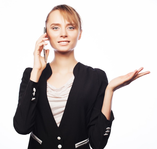 Business people and office concept young business woman with mobile phone Positive emotionIsolated on white