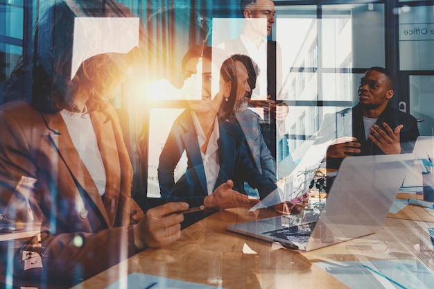 Business people in office work together during a meeting