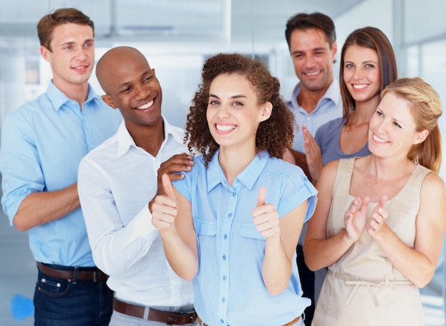 Photo business people portrait smile and thumbs up for success promotion or winning at office group of employees in celebration applause showing thumb emoji yes sign or like for teamwork at workplace