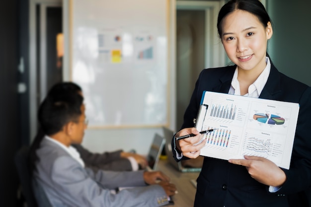 Business people present business ideas to the team while meeting in the office