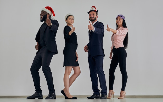 The business people in red hat gesturing on the white wall background