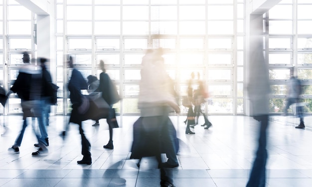 business people rushing at a Exhibition hall