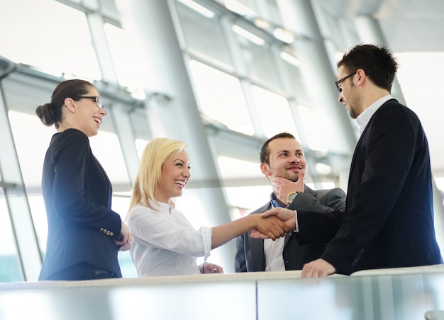 Business people shaking hands after meeting