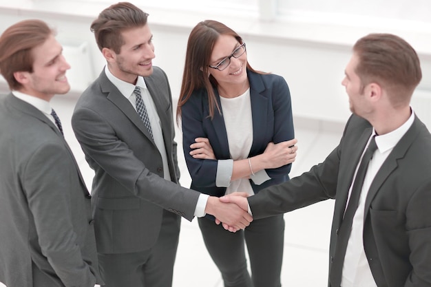 Business people shaking hands finishing up a meeting