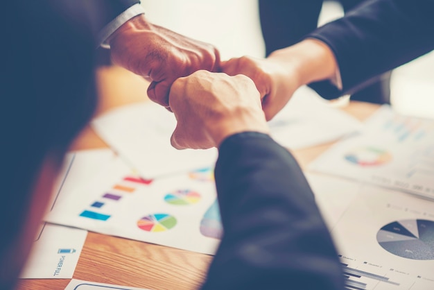 Business people shaking hands, finishing up a meeting