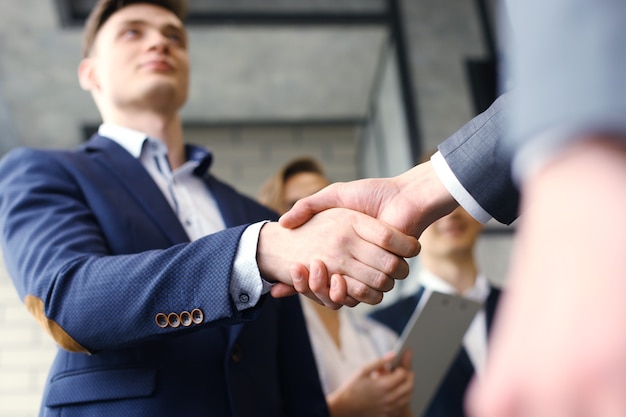 Business people shaking hands, finishing up a meeting