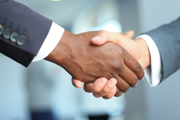 Business people shaking hands, finishing up a meeting