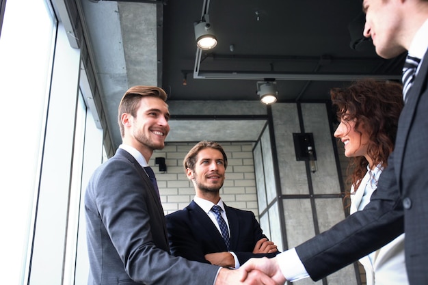 Business people shaking hands, finishing up a meeting