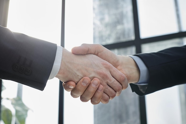 Business people shaking hands lawyers at meeting teamwork partnership success concept