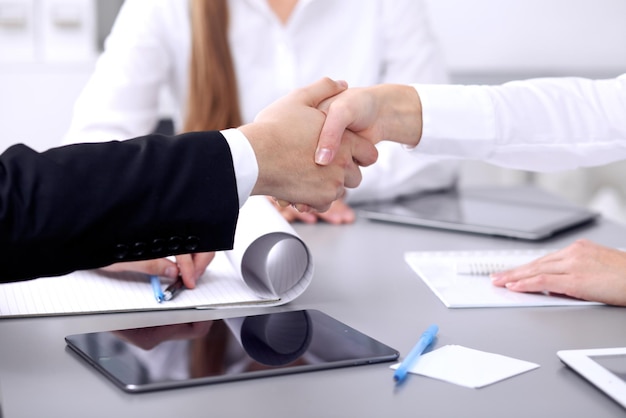 Business people shaking hands at meeting Clouse up of handshake