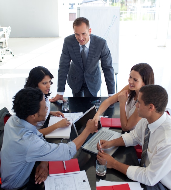 Business people shaking hands in a meeting