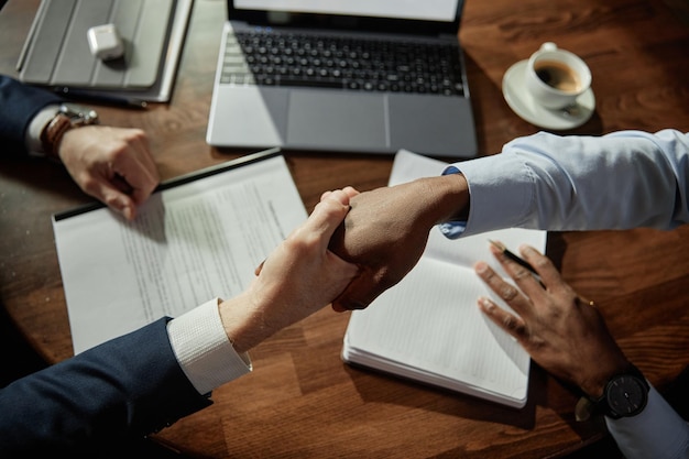 Business people shaking hands at meeting