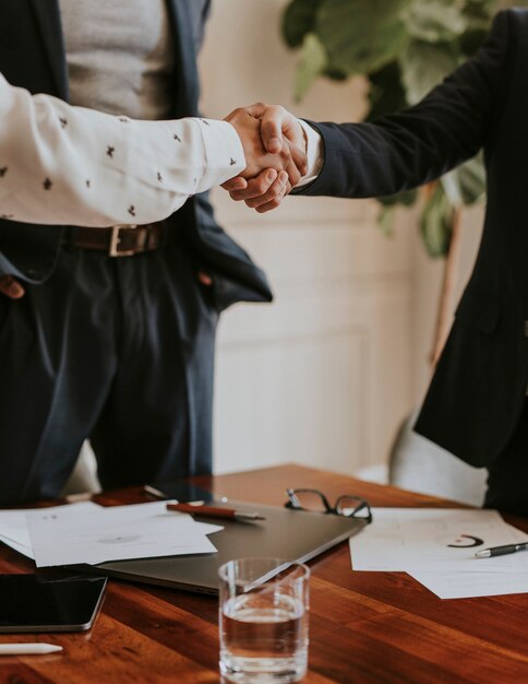 Business people shaking hands at the office